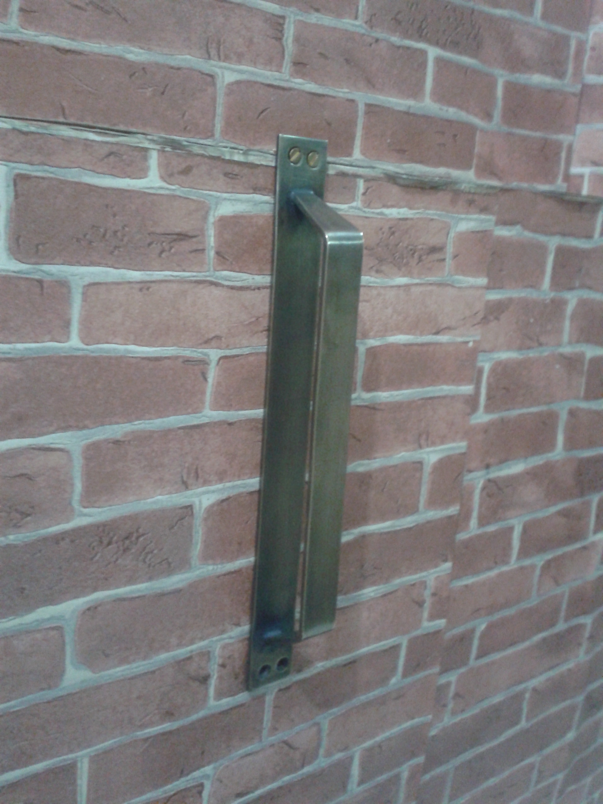 Brass Door Handle Item code A176DTH  size long 25 cm wide 2.5 cm.