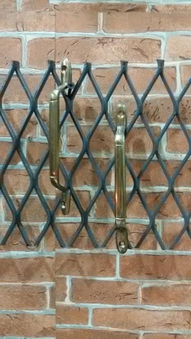 Window Handle material is brass code A14THB size long 152 mm. wide 12 mm.