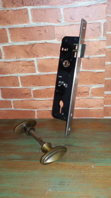 Brass knob Code W.064J size oval handle 55 x 30 mm.