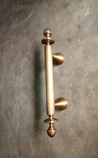 Brass door handle Item Code ACMR18 size long 300 mm. diameter 25 mm. high 50 mm.